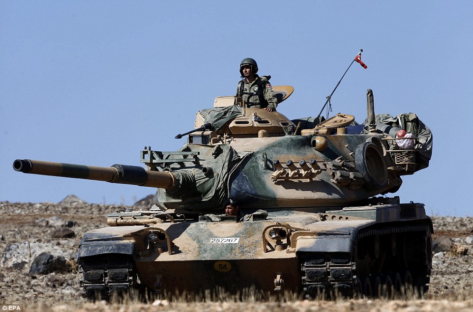 Turkey rolls tanks on Kurdish positions