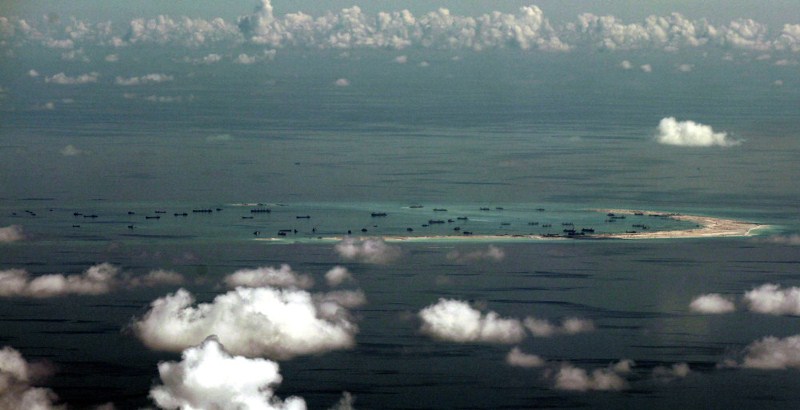 Beijing officially landed military plane on the South China Sea reef