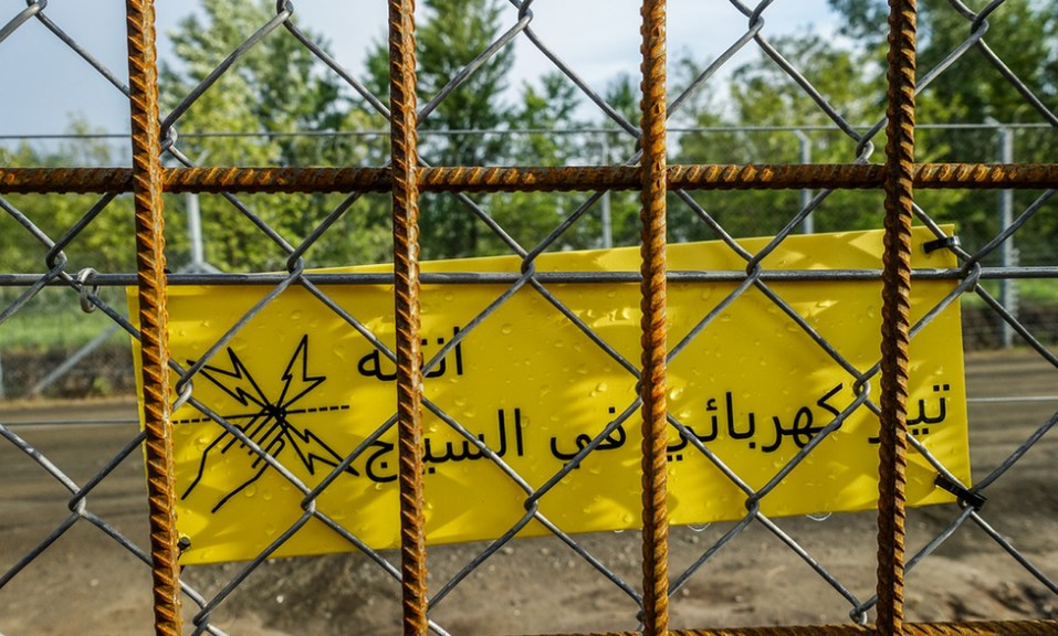 Hungary’s Border Wall To Stop Migrants: Electrocution Warning Signs, Watch Towers And Armed Guards