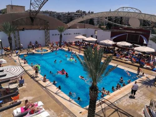 Photos Of Aleppo Rising: Swimsuits, Concerts And Rebuilding In First Jihadi-Free Summer