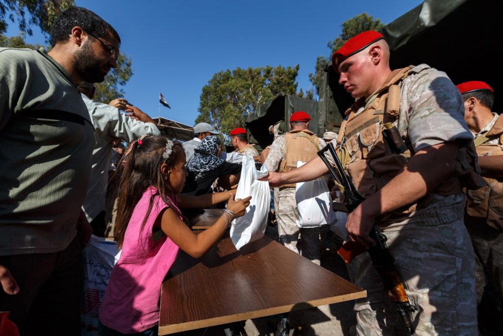 Russian Service Members Provide Humanitarian Aid In Syria's Dar al-Kabirah (Photo Report)