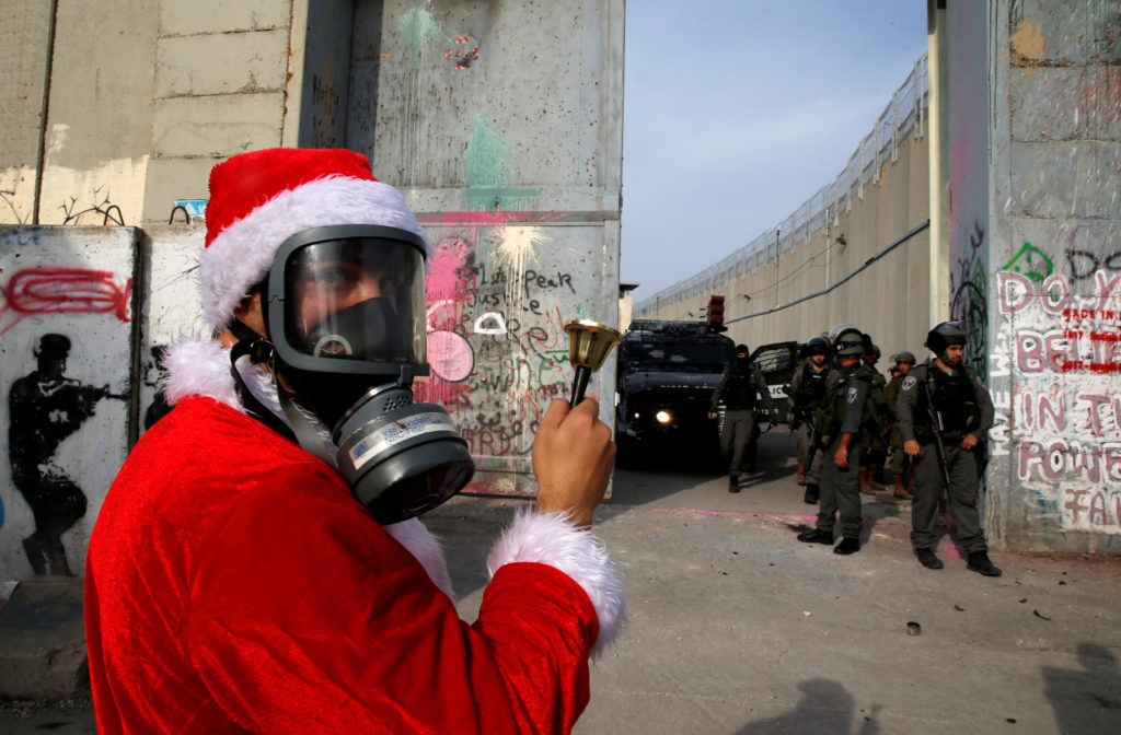 In Photos: Israeli Forces Clash With Palestinian Santa Clauses On Christmas Eve