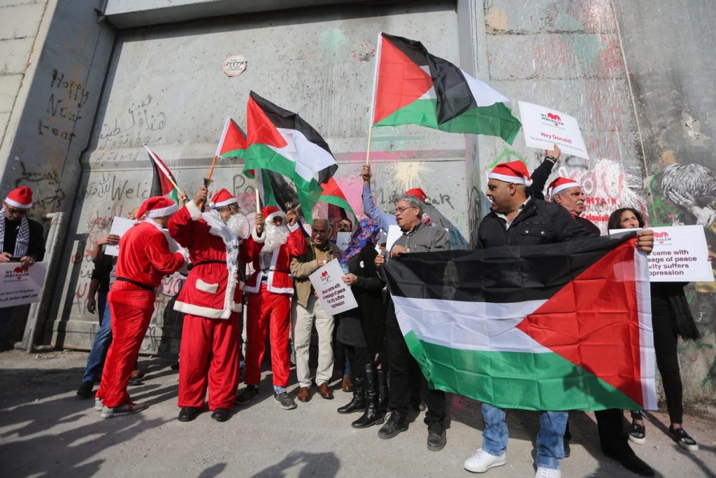 In Photos: Israeli Forces Clash With Palestinian Santa Clauses On Christmas Eve