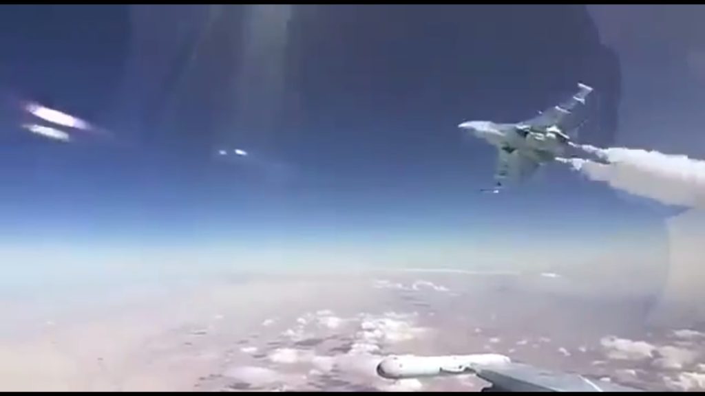 Crazy Cockpit Video: Russian Warplane Buzzes Another At High Altitude