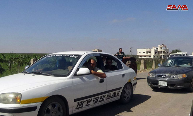 Hundreds Of Displaced Families Return To Their Homes In Syria's Daraa Province (Photos)