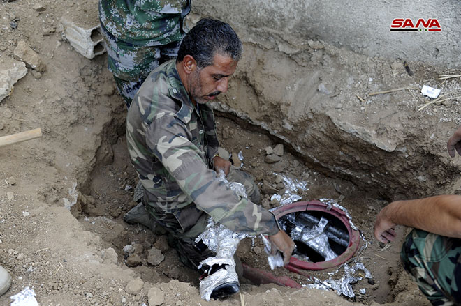 Syrian Security Forces Uncover Weapons Cache In Southern Damascus (Photos)