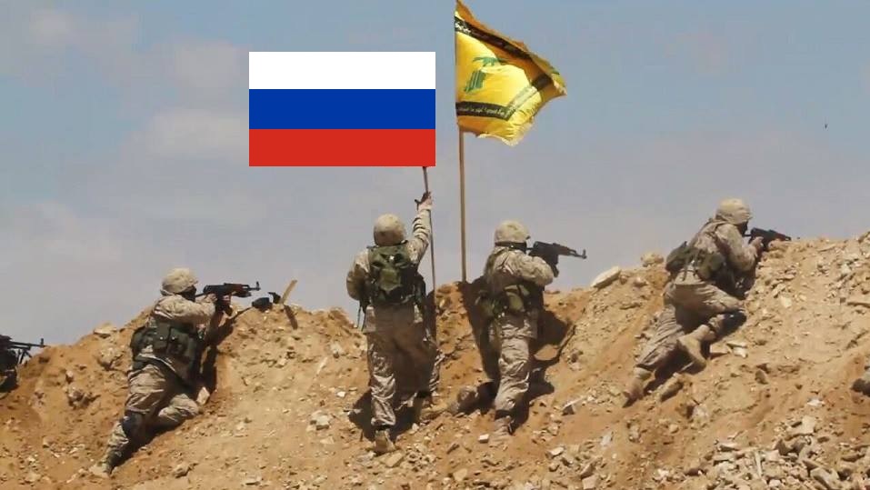 Mimiking "Iranian Forces", “Sneaky Hezbollah” Defends Its Positions With Russian Flags