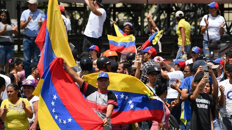 Competing Protests In Venezuela. US Imposes Further Sanctions On Country's State Oil Company