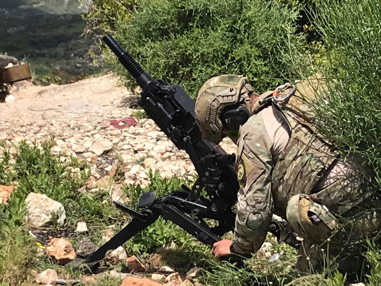 New Photos Show Heavily-Armed Russian Forces In Northern Hama