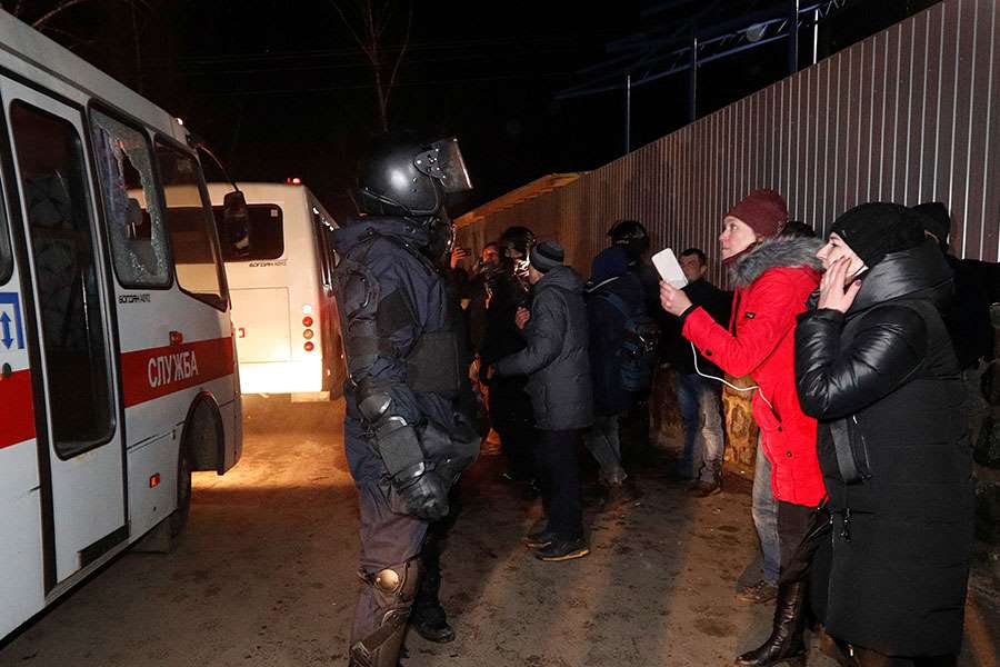 Ukrainians Evacuated From China Greeted Warmly With Riots