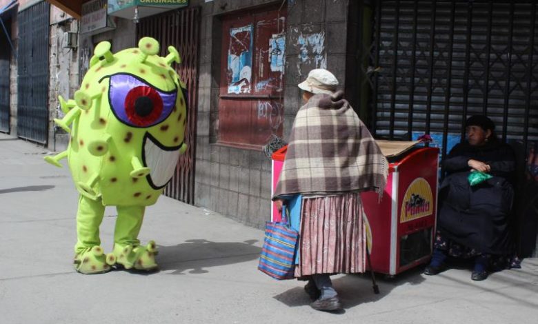 The New Bogeyman? Bolivian Police Dress As COVID-19 To Spread Awareness In La Paz