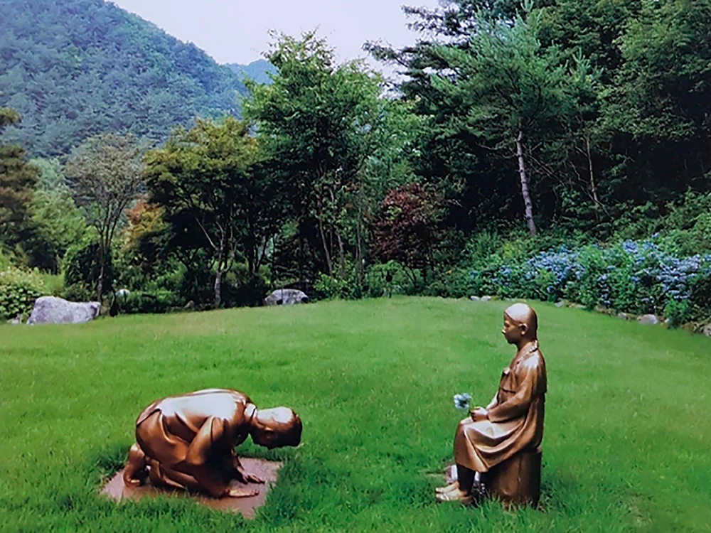 Japan Condemns South Korean Statue Presumably Showing Shinzo Abe Bowing To "Comfort Woman"