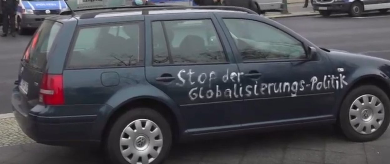 Car Clad In Anti-Globalism Writing Crashes Into Gate Of German Chancellor Merkel's Office