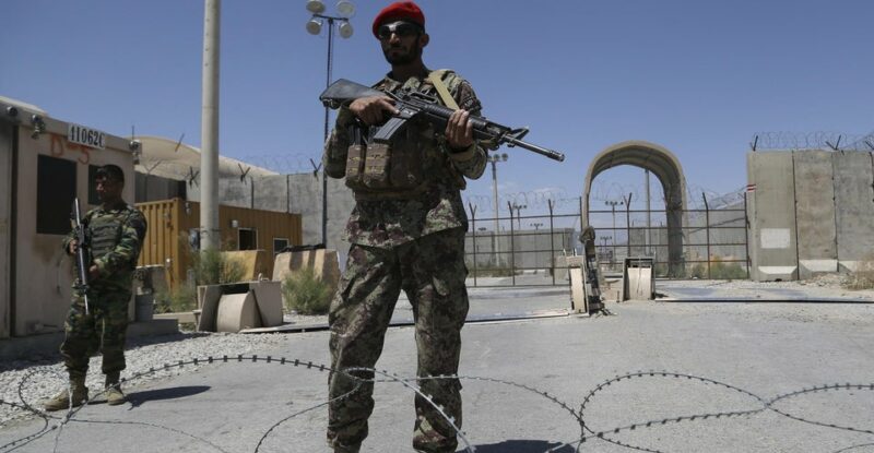 An Afghan National Army (ANA) soldier stands guard at Bagram Air Base, after the departure of all U.S. and NATO troops. ZAKERIA HASHIMI/Getty Images